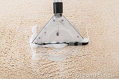 Vacuum Cleaner Over Carpet Stock Photo