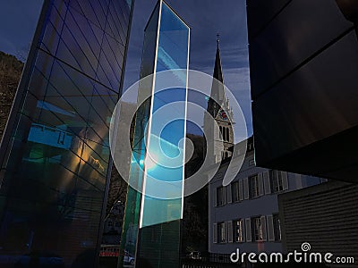 Vaduz Cathedral and Glass monument Stock Photo