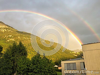 VADUZ, LIECHTENSTEIN, AUGUST 13, 2018 Amazing rainbow after a rain shower Editorial Stock Photo