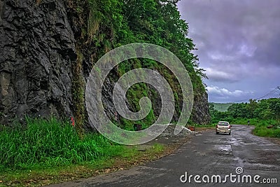 Vehicles moving towards the Hills station area at Vagamon Editorial Stock Photo