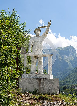 VAGLI SOTTO, LUCCA, ITALY AUGUST 8, 2019: A marble statue of Gregorio De Falco, the coastguard involved in the Costa Editorial Stock Photo