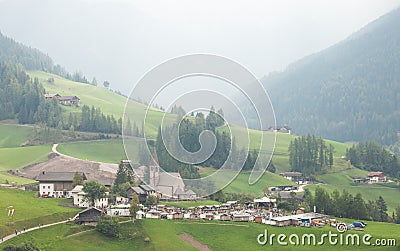 VAL DI FUNES, ITALY - OCTOBER 01, 2016: Every year in October next to the small Italian little church of St. Magdalena in Val di Editorial Stock Photo