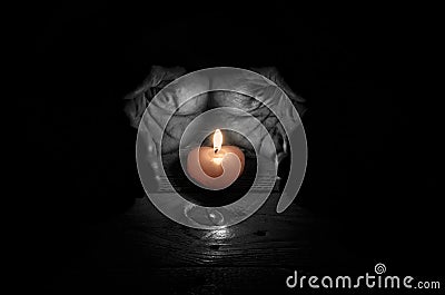 Valentine Candle and male hands. Stock Photo