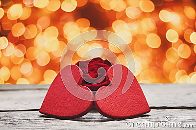 Valentine day background, handmade hearts on wood with holiday lights Stock Photo