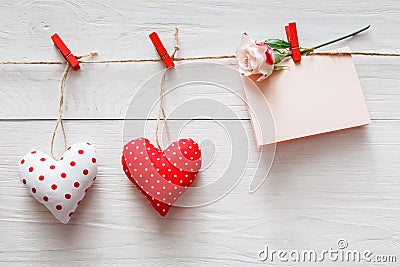 Valentine day background, pillow hearts and card on wood Stock Photo
