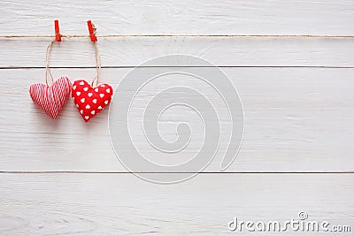 Valentine day background, pillow hearts couple on wood, copy space Stock Photo