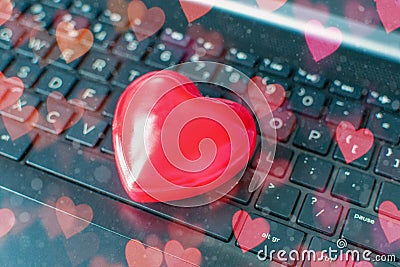 Valentine Day online Shopping. Laptop, red heart. Online communication, virtual love, loneliness web Internet. Romantic Stock Photo