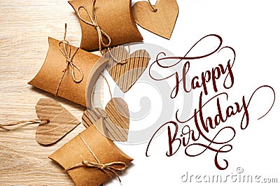 Valentine Gift and Heart on white background and text Happy Birthday. Calligraphy lettering Stock Photo