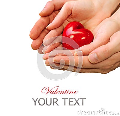 Valentine Heart in Man and Woman Hands Stock Photo