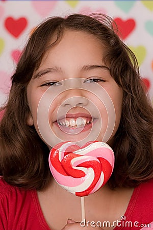 Valentine lollipop and girl Stock Photo