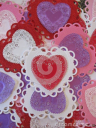Valentine red, pink, purple, and white lace and doily hearts, vertical Stock Photo
