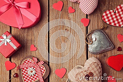 Valentine's day background with heart shapes on wooden table. View from top Stock Photo