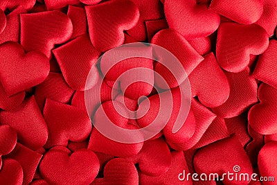 Valentine`s Day Background. Holiday Abstract Valentine Background with red satin Hearts. Heart Shape Backdrop Stock Photo