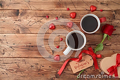 Valentine`s day concept with coffee cups, heart shape chocolate, rose flower and gift box Stock Photo