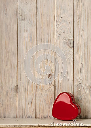 Valentine`s day concept. Red metal box in heart shape on a light Stock Photo