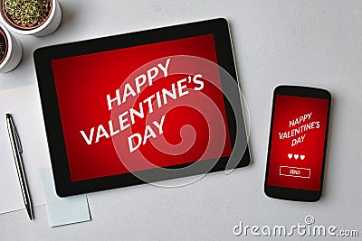 Valentine`s day concept on tablet and smartphone screen Stock Photo