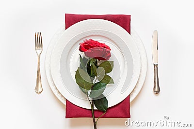 Valentine`s day dinner. Romantic table setting with red rose. View from above Stock Photo