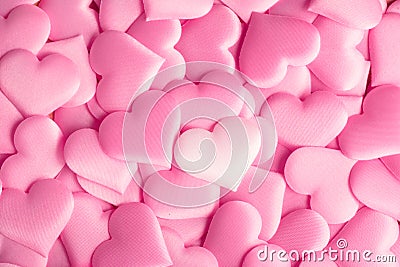 Valentine`s Day. Holiday abstract pink Valentine background with satin hearts. Love Stock Photo