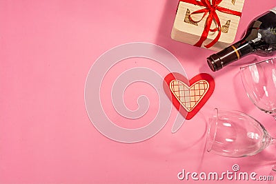 Valentine`s day image, Bottle and glasses of wine, on a pink background. 2 Stock Photo