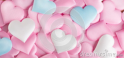 Valentine`s Day. Pink heart shape backdrop. Abstract Valentine background with pink, white and blue pastel color satin hearts Stock Photo