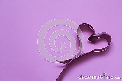 Valentine`s Day. Ribbon hearts on purple background. Flat lay, top view, copy space Stock Photo