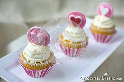 Valentine's french vanilla cupcake with heart gumpaste topper Stock Photo