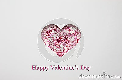 valentine's day greeting card is cut out of paper in the shape of a heart. happy Valentine's Stock Photo