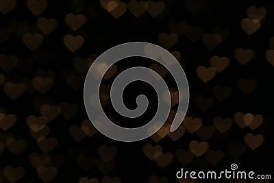 Valentines Colorful heart-shaped on black background lighting bokeh for decoration at night backdrop wallpaper blurred valentine Stock Photo