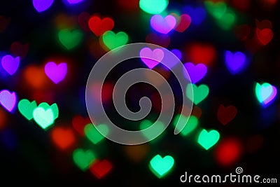 Valentines Colorful heart-shaped bokeh on black background lighting bokeh for decoration at night wallpaper blur valentine Stock Photo