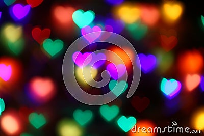 Valentines Colorful heart-shaped bokeh on black background lighting bokeh for decoration at night wallpaper valentine Stock Photo