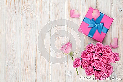 Valentines day background with gift box full of pink roses Stock Photo