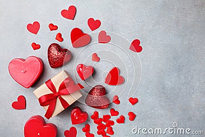 Valentines day background with gift box and red hearts Stock Photo