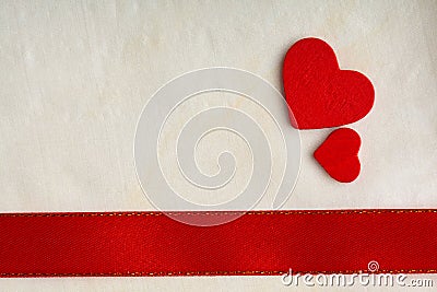 Valentines day background. Red satin ribbon and hearts. Stock Photo