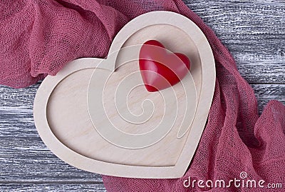 Valentines Day background texture wooden heart gray plank fabric. Stock Photo