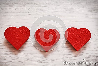 Valentines day background with three hearts Stock Photo