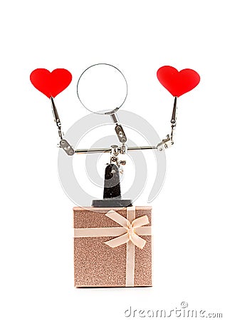 Valentines Day background with tool third hand holding hearts and gift Stock Photo