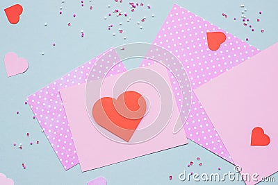 Valentines day background. Valentine card with heart and craft paper on the blue background Stock Photo