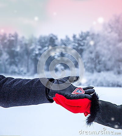 Valentines day background. Valentine& x27;s day. Close up of woman and man hands with heart Stock Photo