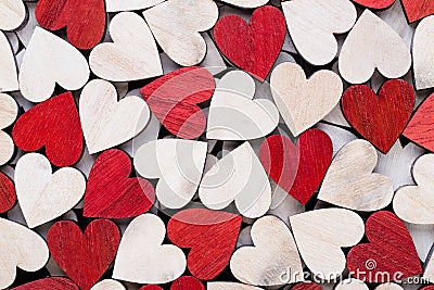 Valentines day background with white end red hearts on wooden background Stock Photo