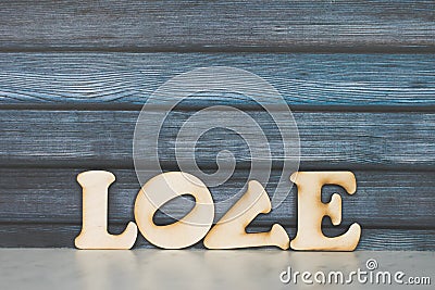 Valentines Day card background. Decorative wooden word on dark background. Valentine Day. Love concept. Copyspace Stock Photo