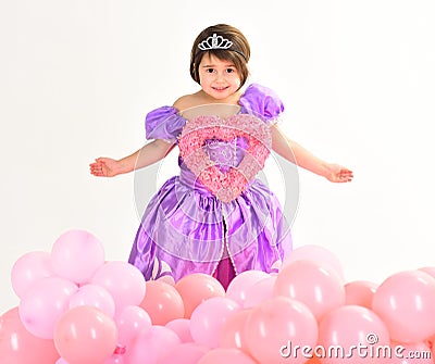 Valentines day. Childhood happiness. Kid fashion. Little miss in beautiful dress. Childrens day. Small pretty child hold Stock Photo