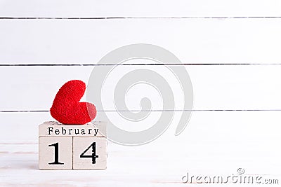 Valentines day concept. February 14 text on wooden block Stock Photo
