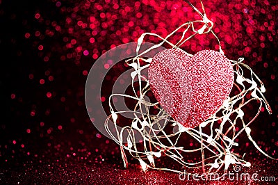 Valentines day dark red Red heart with light background.Sparkling glittering maroon,burgundy black color night light elegance,smoo Stock Photo