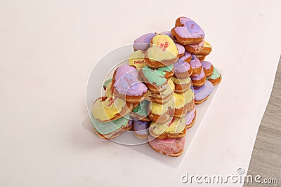 Valentines day donuts stacked up on top of each other Stock Photo