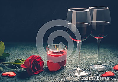 Valentines day greeting card concept. Wine glasses, rose and can Stock Photo