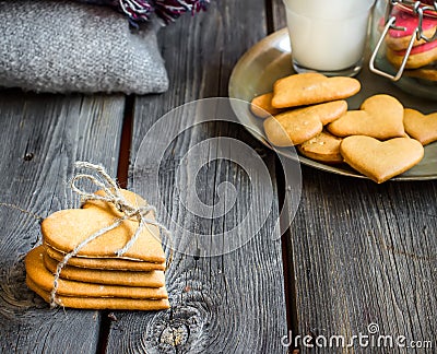 Valentines day heart shaped cookies and glass of milk. Stock Photo