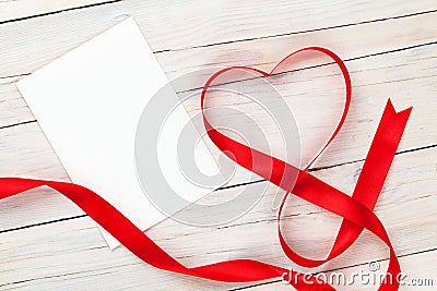 Valentines day heart shaped red ribbon and blank greeting card Stock Photo