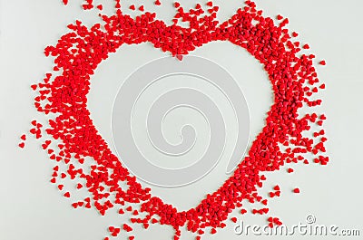 Valentines day love background. Red sugar hearts in the shape of a big heart. Creeting card for Valentines Day. Stock Photo