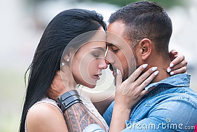 Valentines Day. Valentines couple in love. Saint Valentine. Beautiful couple is kissing. Beautiful young couple smiling Stock Photo