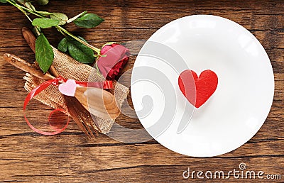 Valentines dinner romantic love food and love cooking concept / Red heart on white plate romantic table setting Stock Photo